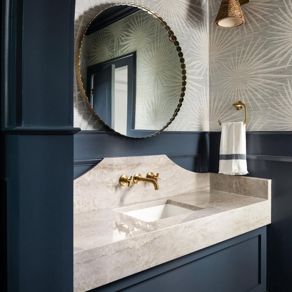 Decorative wallcovering detail in a refined bathroom